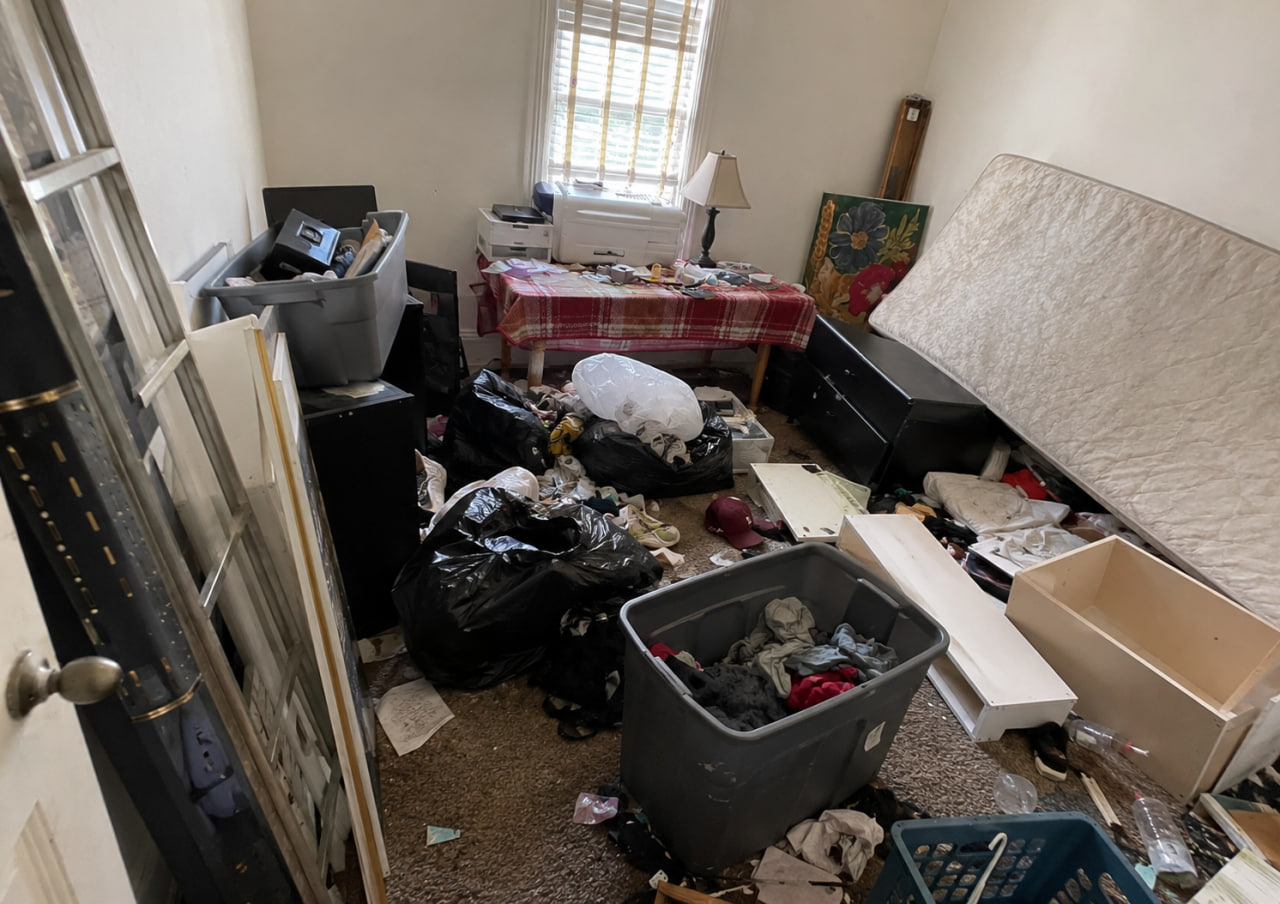 Cluttered bedroom before ClearOut cleanout